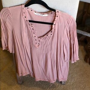 Short sleeve top with grommet details